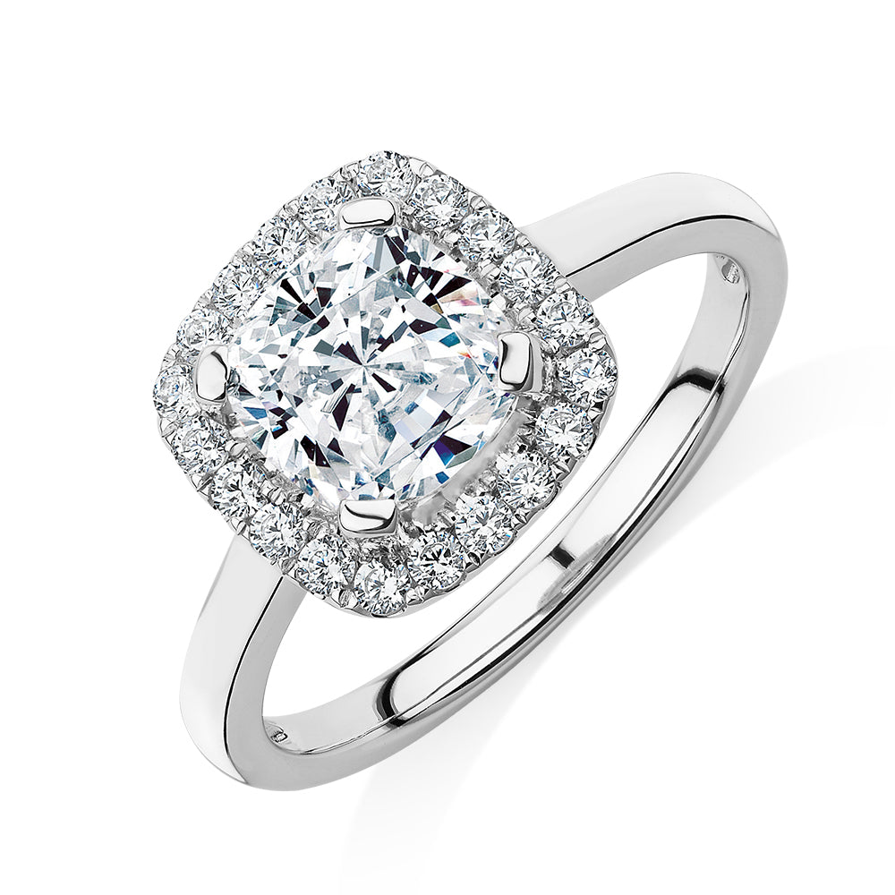 Cushion and Round Brilliant halo engagement ring with 1.58 carats* of diamond simulants in 10 carat white gold