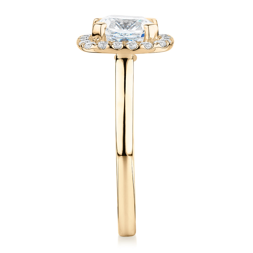 Cushion and Round Brilliant halo engagement ring with 1.58 carats* of diamond simulants in 10 carat yellow gold