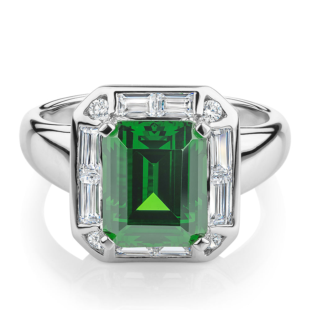 Dress ring with 10x8mm emerald simulant and 1.02 carats* of diamond simulants in 10 carat white gold