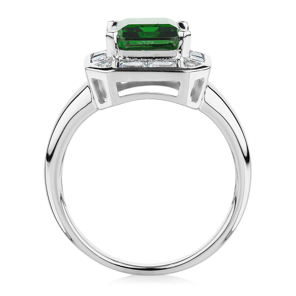 Dress ring with 10x8mm emerald simulant and 1.02 carats* of diamond simulants in 10 carat white gold