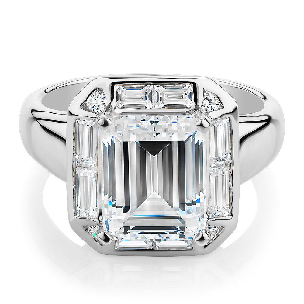 Emerald Cut, Baguette and Round Brilliant halo engagement ring with 4.53 carats* of diamond simulants in 10 carat white gold