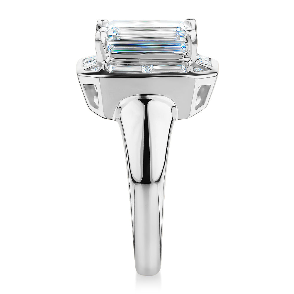 Emerald Cut, Baguette and Round Brilliant halo engagement ring with 4.53 carats* of diamond simulants in 10 carat white gold