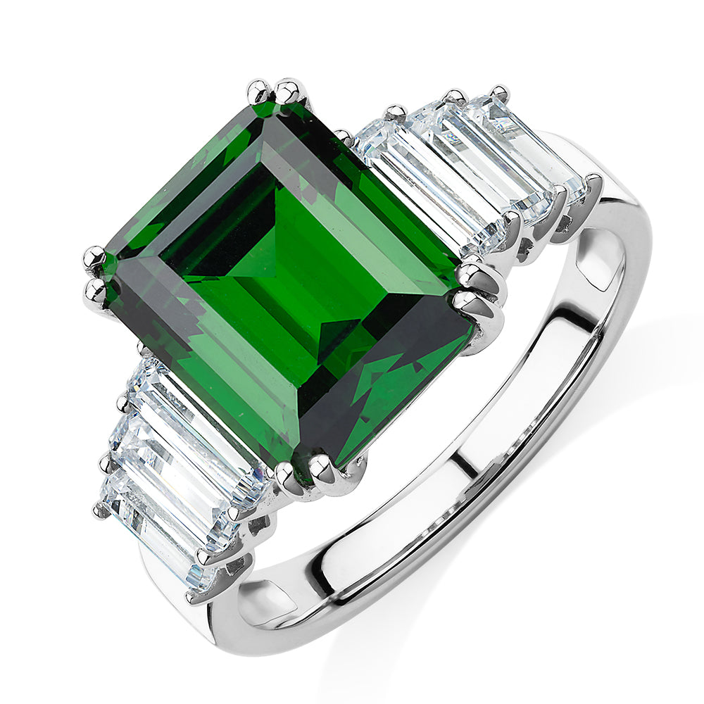 Dress ring with emerald simulant and 1.44 carats* of diamond simulants in 10 carat white gold