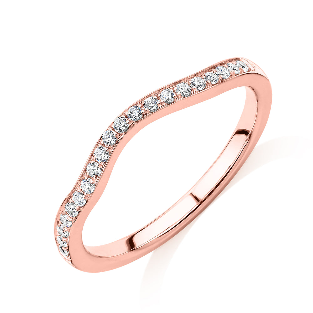 Round Brilliant curved wedding or eternity band in 14 carat rose gold