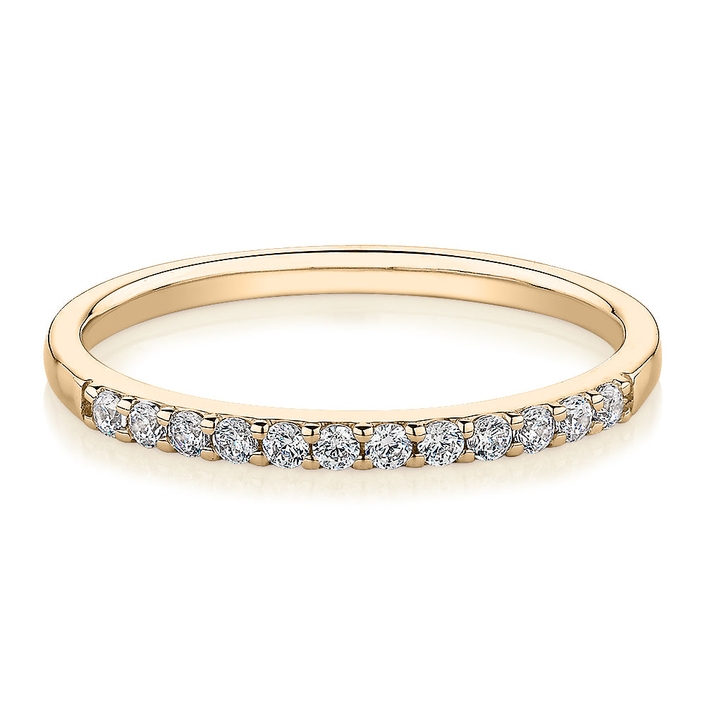 Wedding or eternity band in 14 carat yellow gold