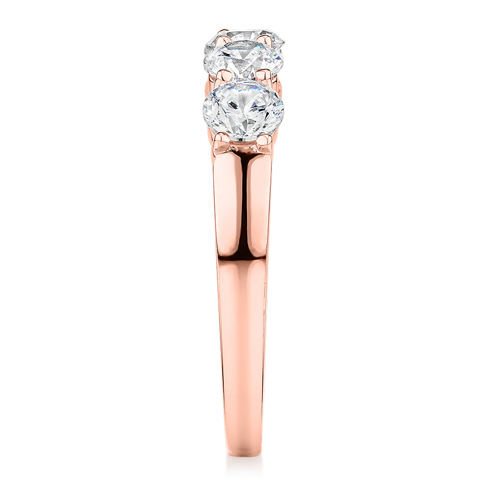 Dress ring with 1 carat* of diamond simulants in 14 carat rose gold