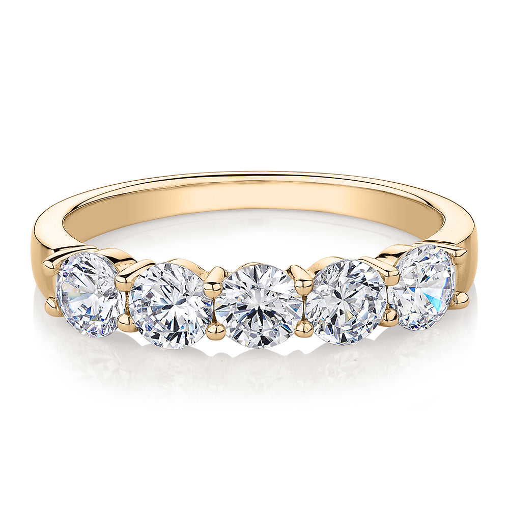 Dress ring with 1 carat* of diamond simulants in 14 carat yellow gold