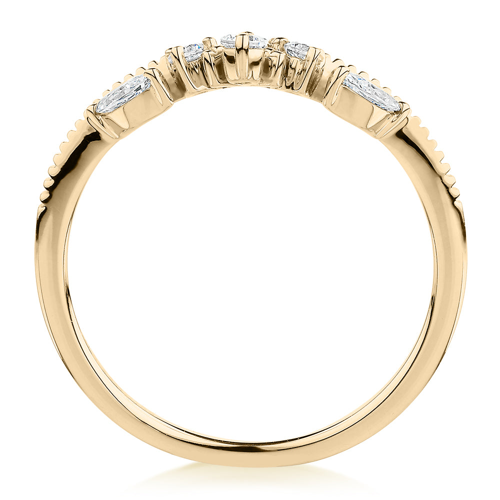 Round Brilliant curved wedding or eternity band with 0.29 carats* of diamond simulants in 10 carat yellow gold
