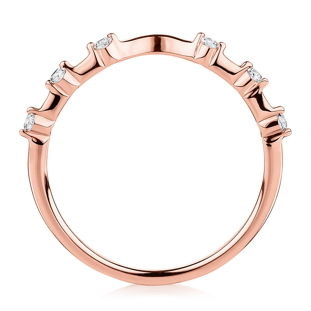 Wedding or eternity band with diamond simulants in 14 carat rose gold
