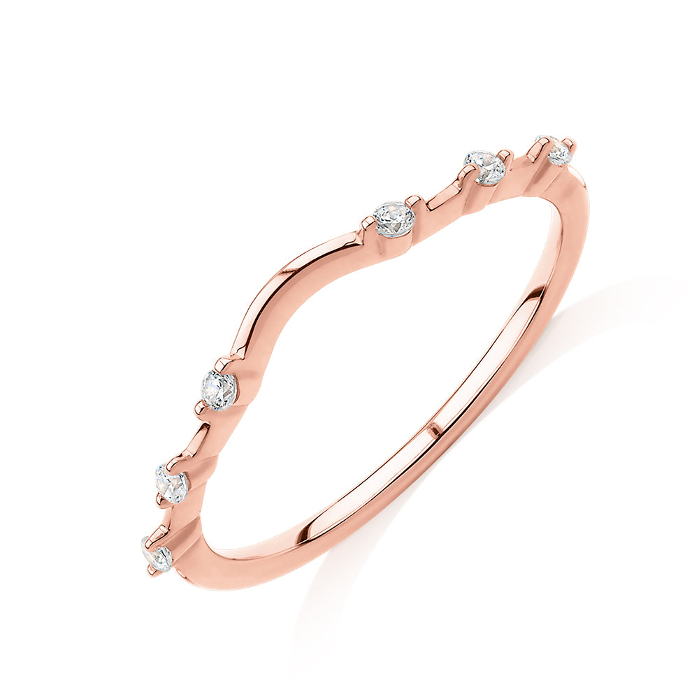 Wedding or eternity band with diamond simulants in 14 carat rose gold