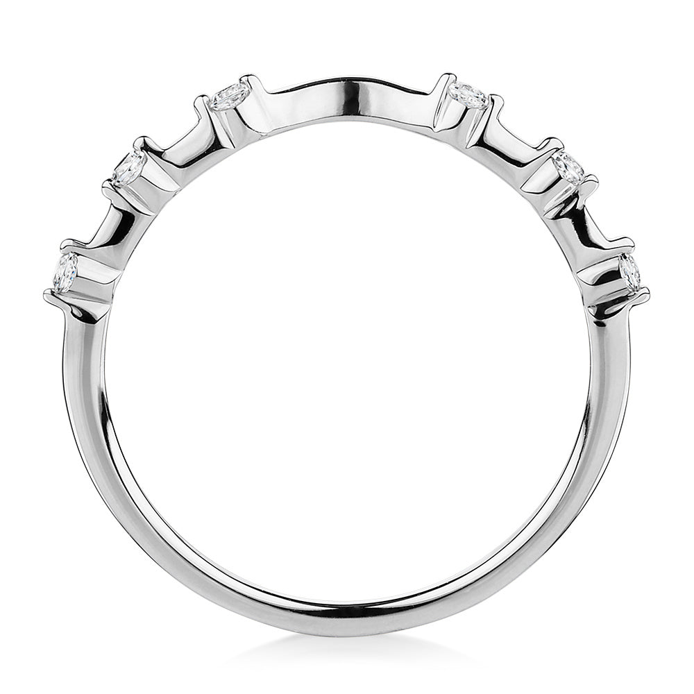Wedding or eternity band with diamond simulants in 14 carat white gold
