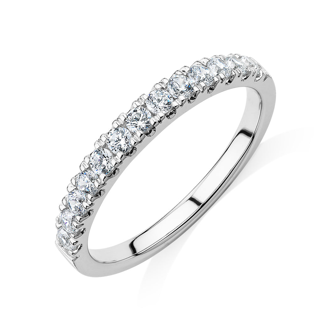 Wedding or eternity band with 0.39 carats* of diamond simulants in 10 carat white gold