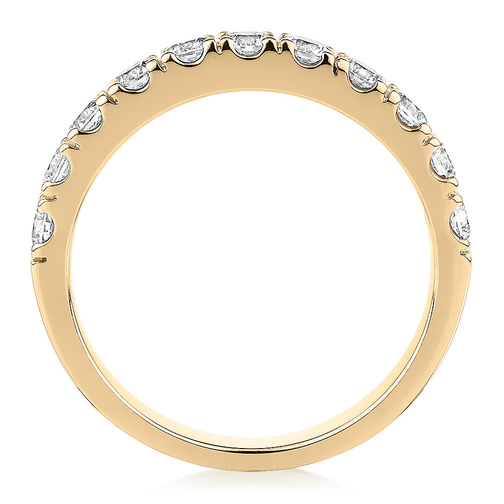 Wedding or eternity band with 0.88 carats* of diamond simulants in 14 carat yellow gold