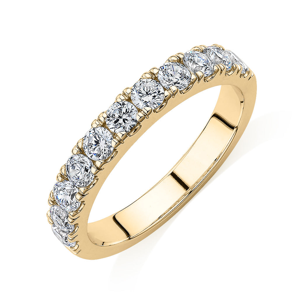Wedding or eternity band with 0.88 carats* of diamond simulants in 14 carat yellow gold