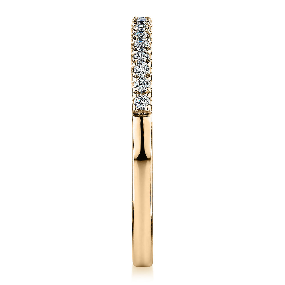 Wedding or eternity band in 14 carat yellow gold
