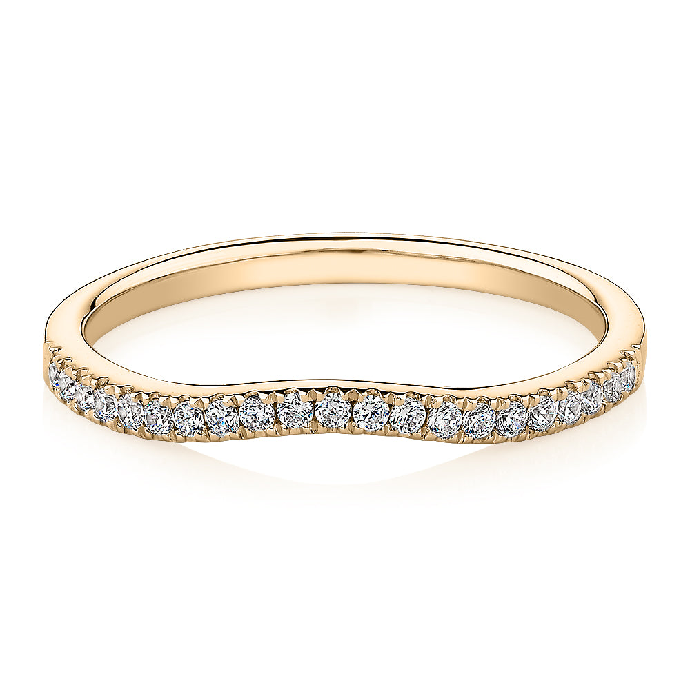 Curved wedding or eternity band in 14 carat yellow gold