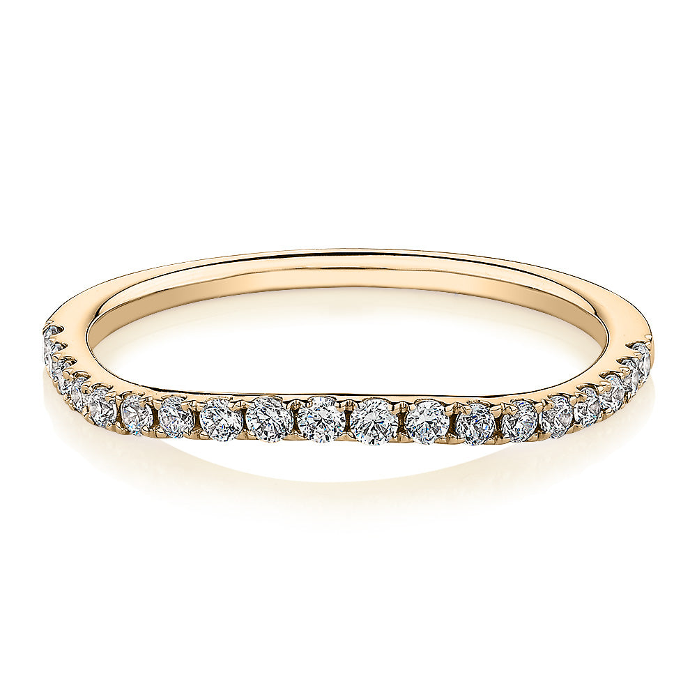 Curved wedding or eternity band in 10 carat yellow gold