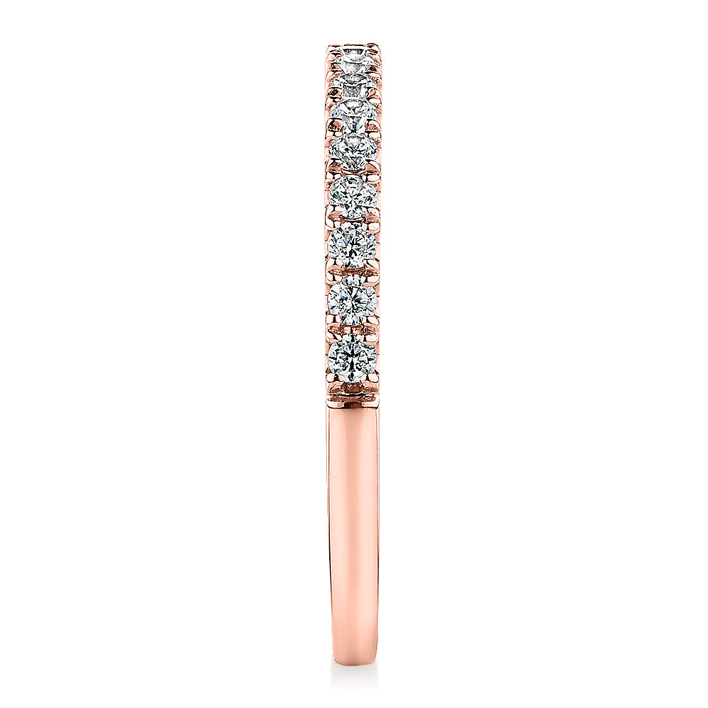 Wedding or eternity band with 0.25 carats* of diamond simulants in 10 carat rose gold
