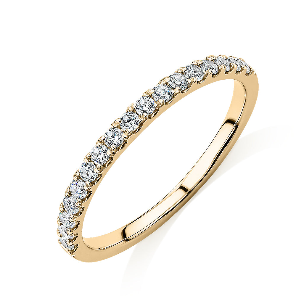 Wedding or eternity band with 0.25 carats* of diamond simulants in 10 carat yellow gold