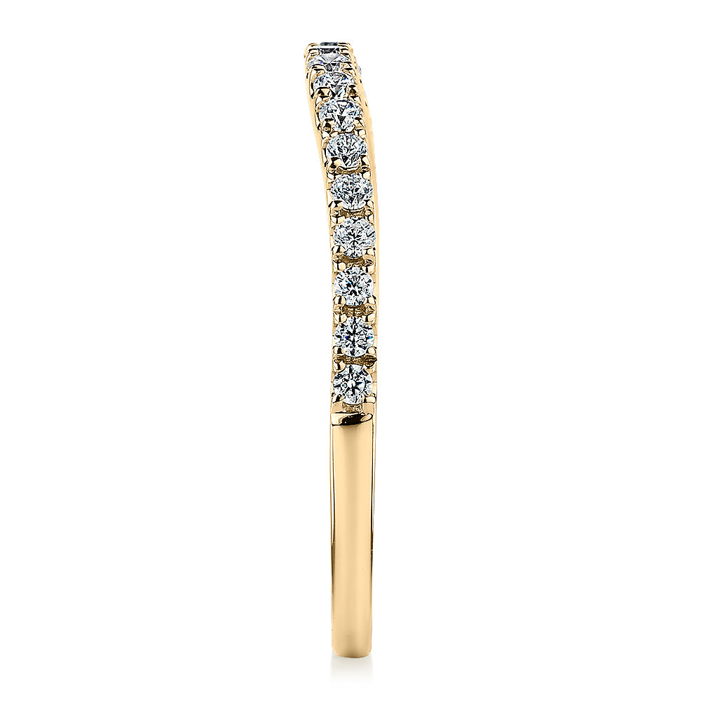 Curved wedding or eternity band with 0.25 carats* of diamond simulants in 10 carat yellow gold
