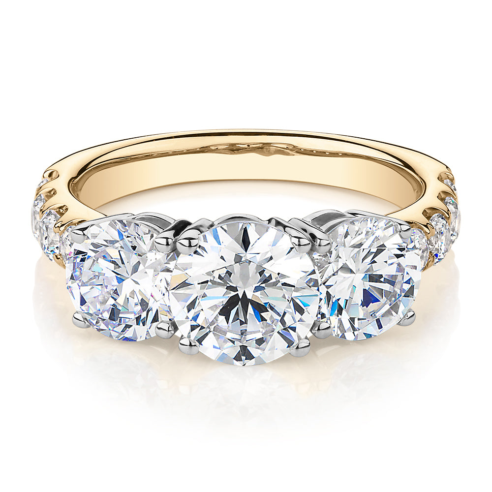 Three stone diamond ring on sale yellow gold