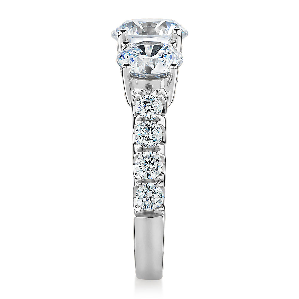 Three stone ring with 3.44 carats* of diamond simulants in 10 carat white gold
