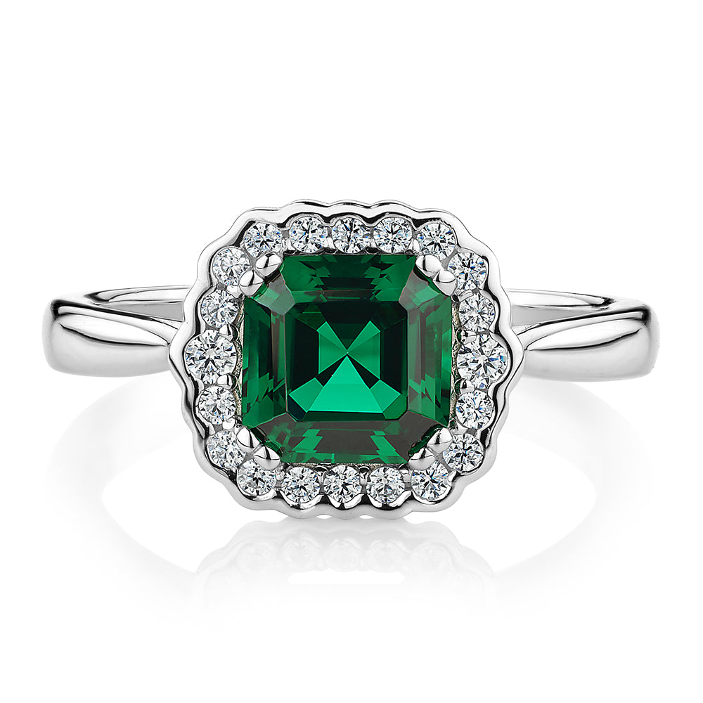 Dress ring with emerald simulant in sterling silver