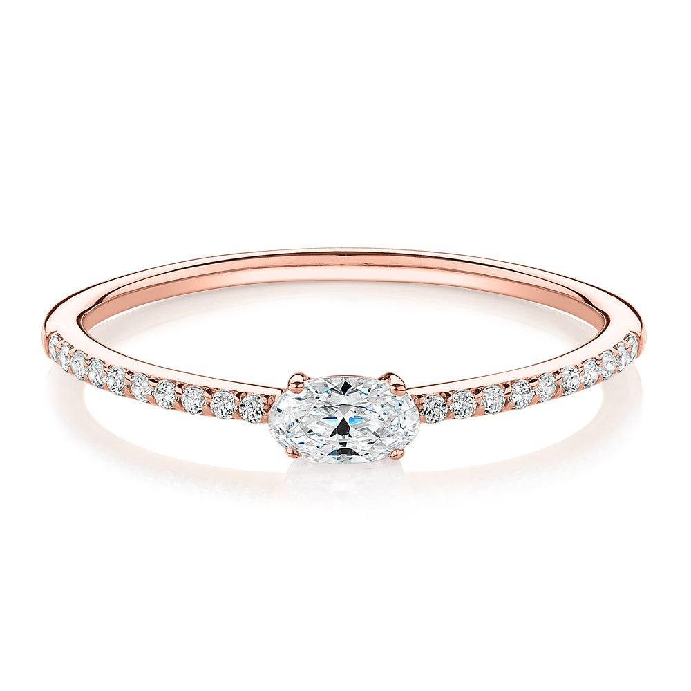 Dress ring with 0.31 carats of diamond simulants in 10 carat rose gold