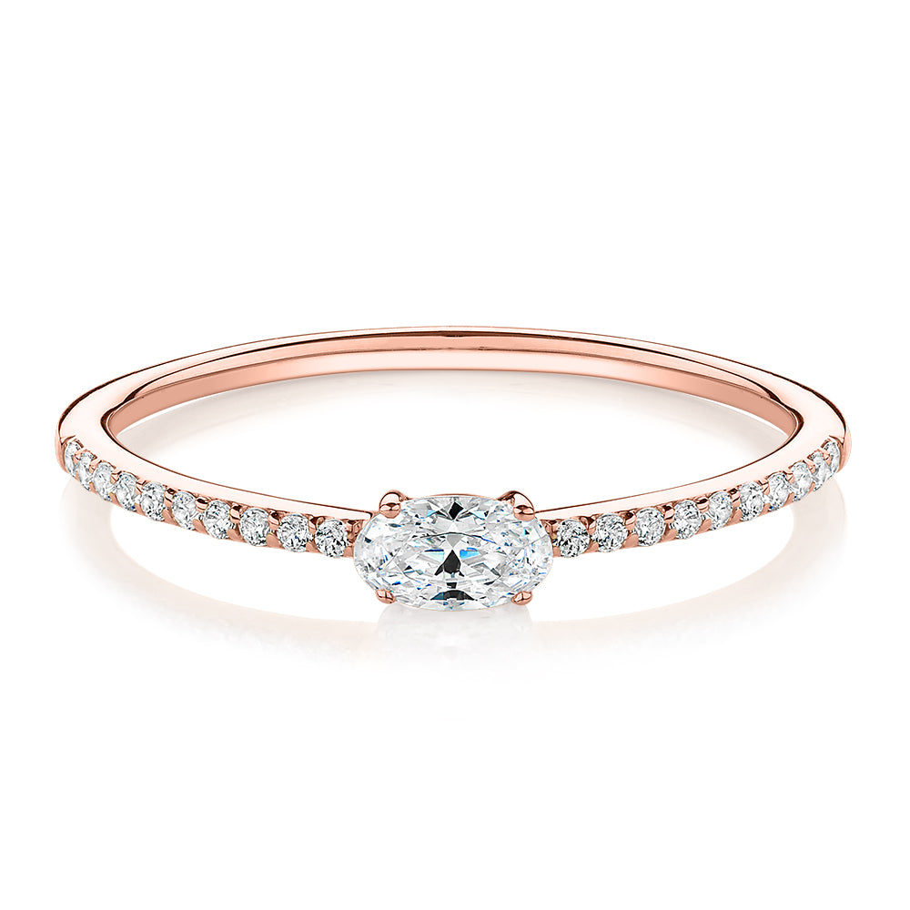 Dress ring with 0.31 carats* of diamond simulants in 10 carat rose gold