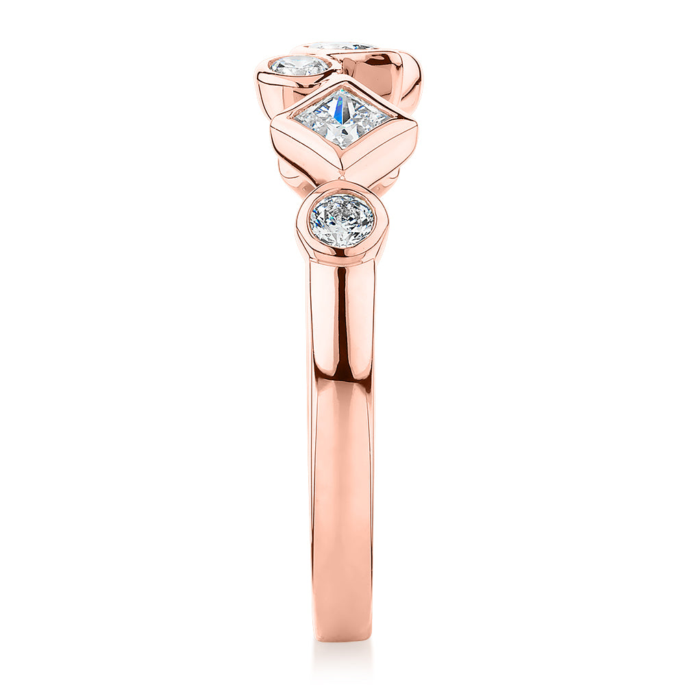 Dress ring with 0.48 carats* of diamond simulants in 10 carat rose gold