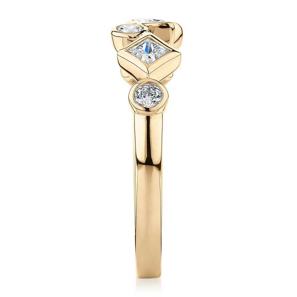 Dress ring with 0.48 carats* of diamond simulants in 10 carat yellow gold