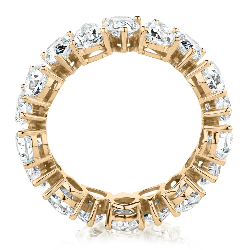 All-rounder eternity band with 7.02 carats* of diamond simulants in 10 carat yellow gold