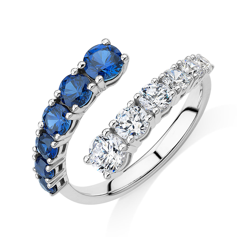 Dress ring with sapphire simulants and 0.91 carats* of diamond simulants in 10 carat white gold
