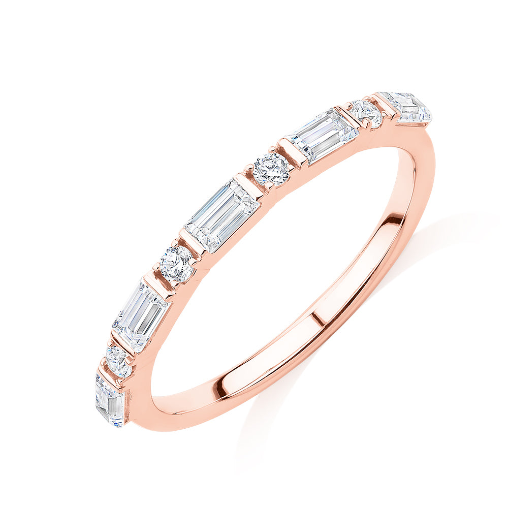 Baguette wedding or eternity band with 0.75 carats* of diamond simulants in 10 carat rose gold