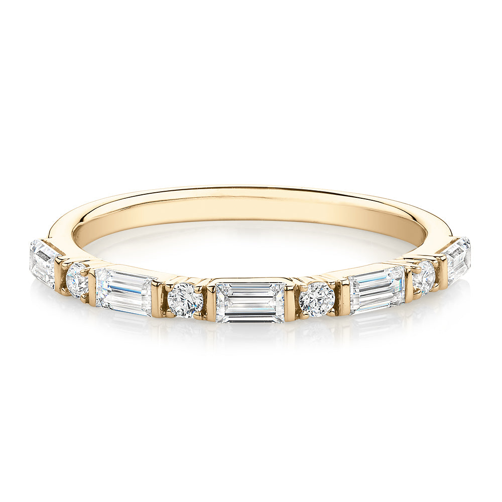 Baguette wedding or eternity band with 0.75 carats* of diamond simulants in 10 carat yellow gold
