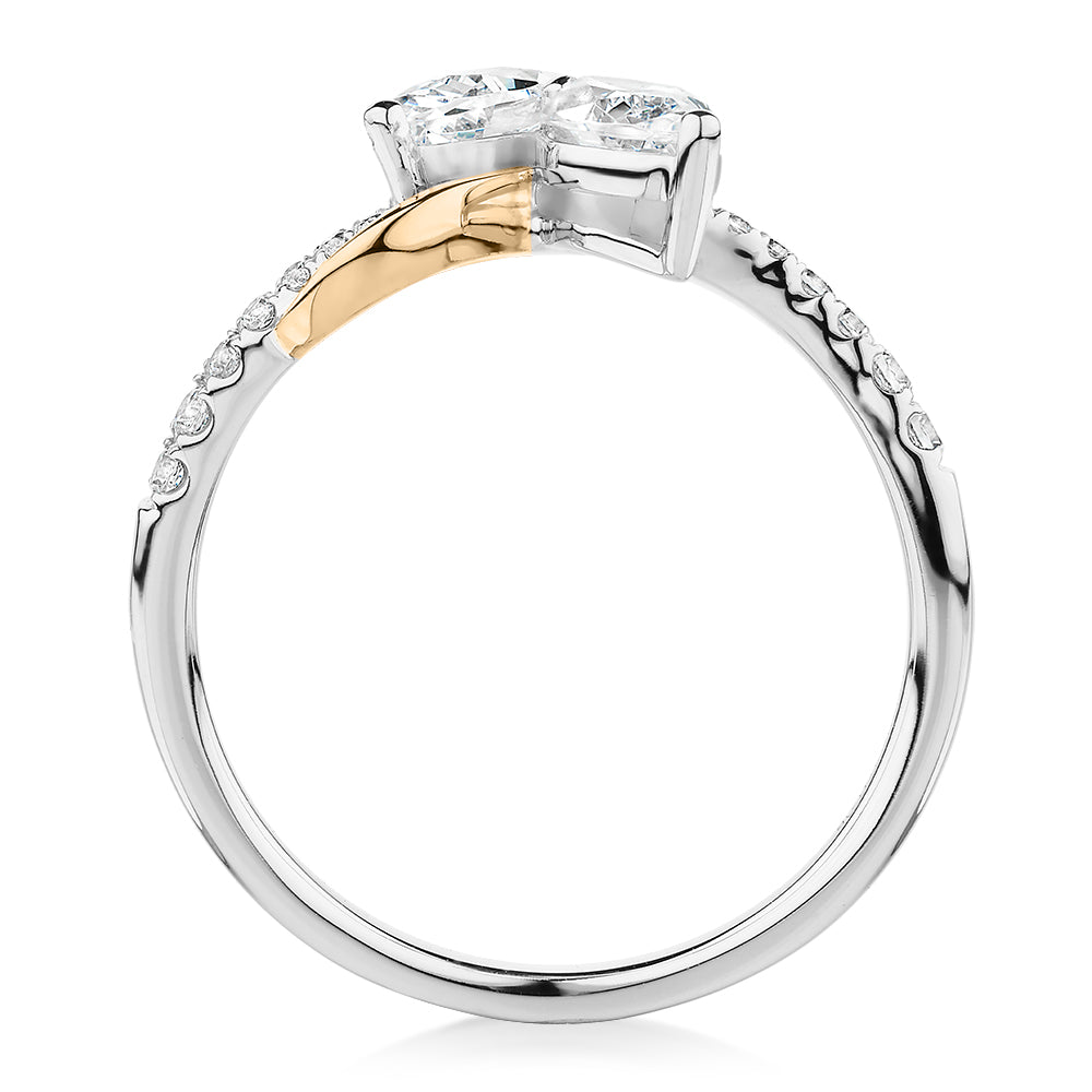 Dress ring with 1.06 carats* of diamond simulants in 10 carat yellow and white gold