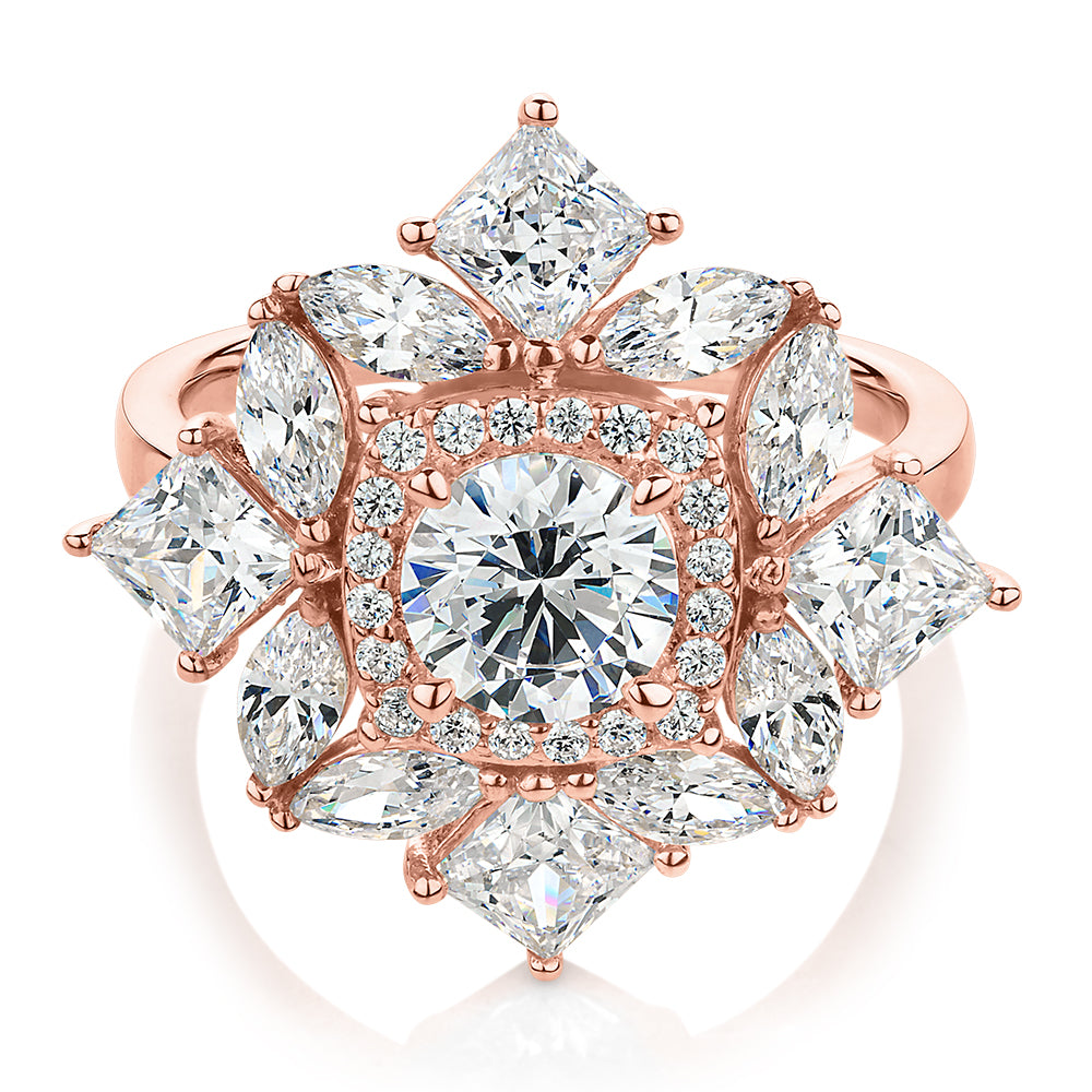 Dress ring with 3.86 carats* of diamond simulants in 10 carat rose gold