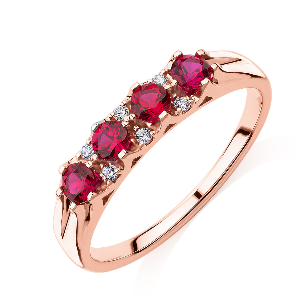 Dress ring with ruby and diamond simulants in 10 carat rose gold