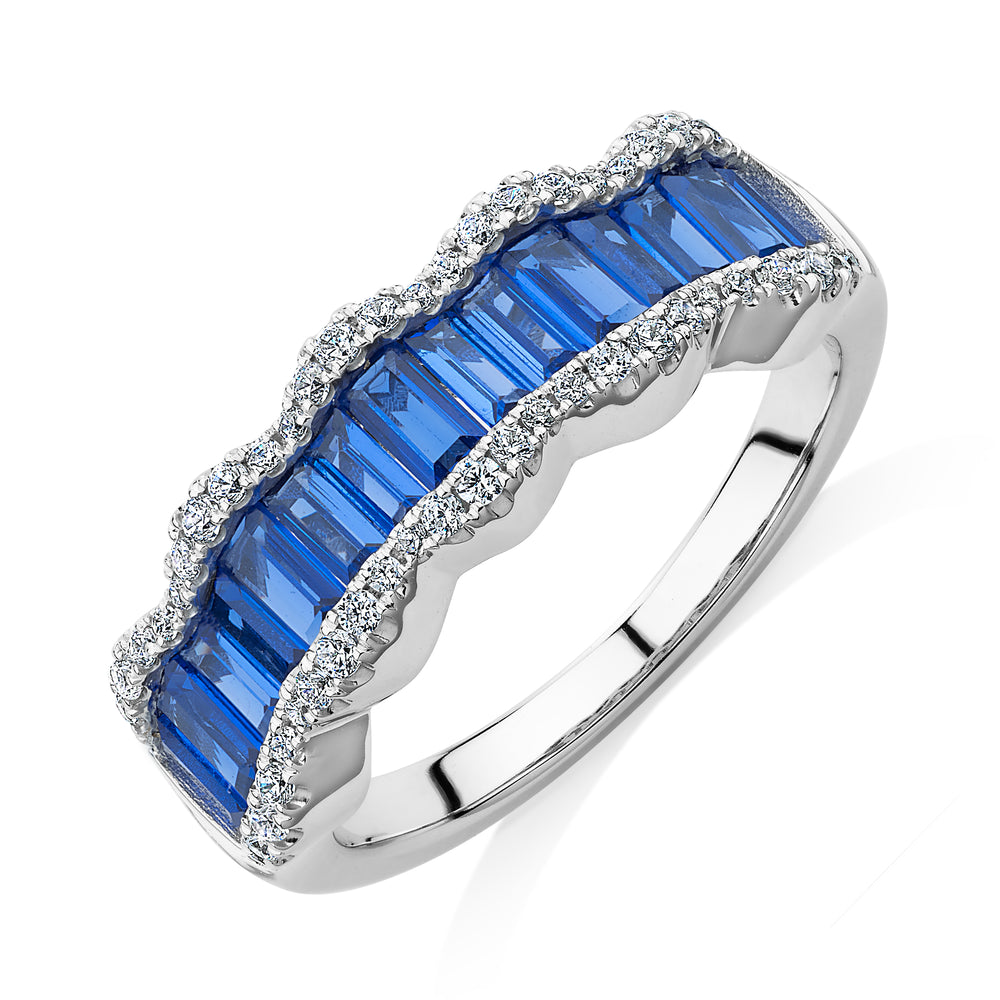 Dress ring with sapphire simulants and 0.24 carats* of diamond simulants in 10 carat white gold