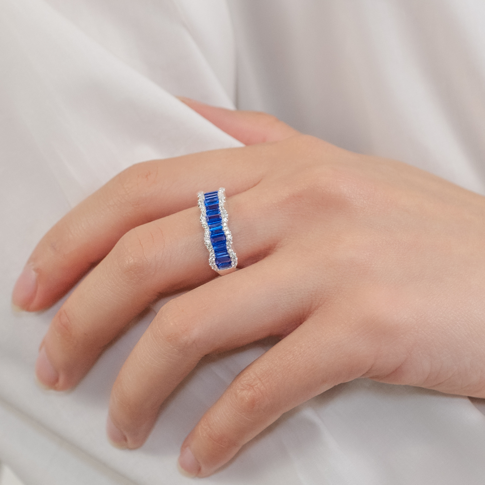 Dress ring with sapphire simulants and 0.24 carats* of diamond simulants in 10 carat white gold