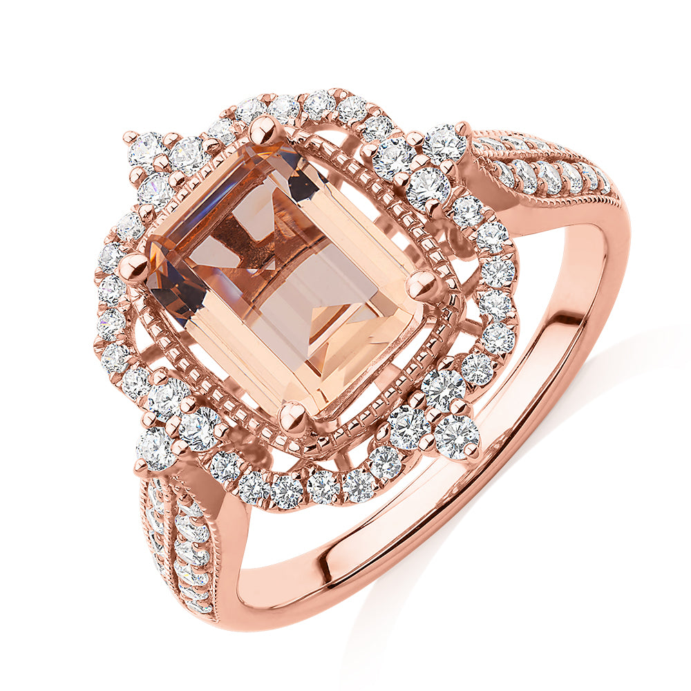 Emerald Cut and Round Brilliant halo engagement ring with morganite simulant and 0.48 carats* of diamond simulants in 10 carat rose gold