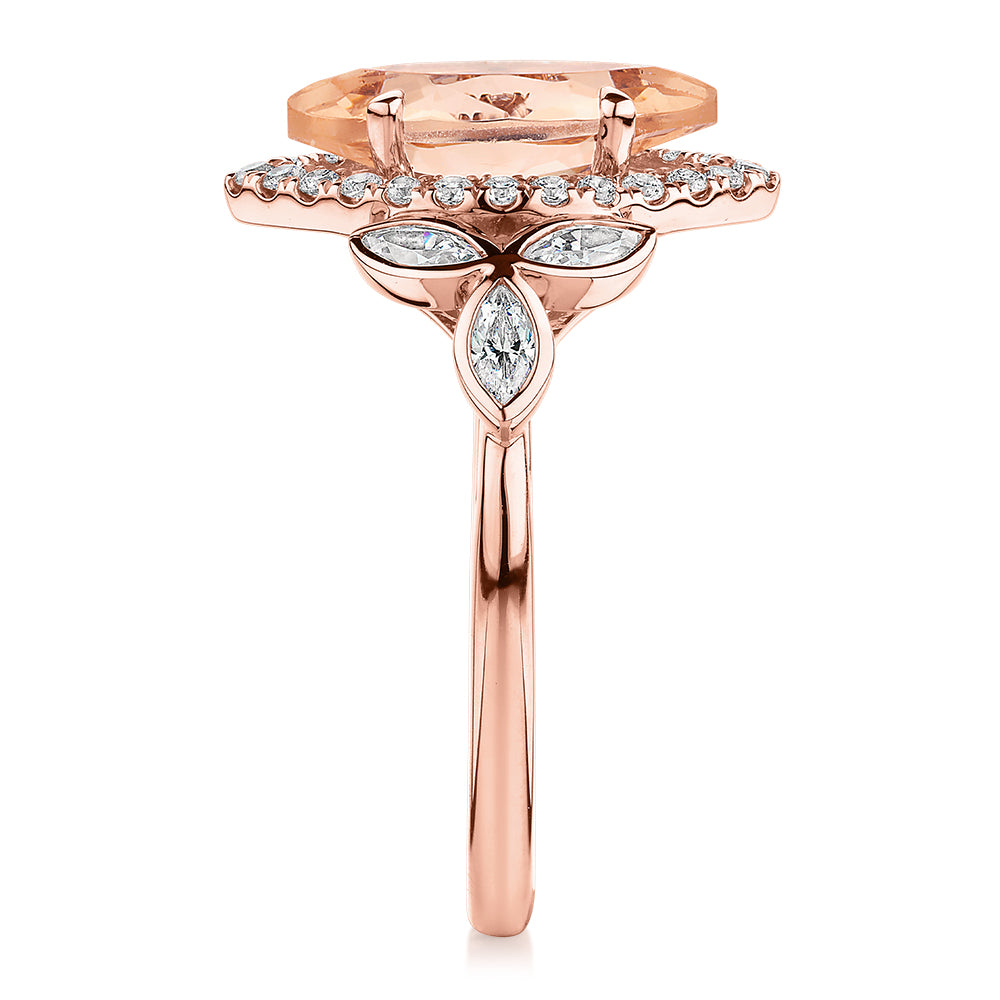 Marquise and Round Brilliant halo engagement ring with morganite simulant and 0.84 carats* of diamond simulants in 10 carat rose gold