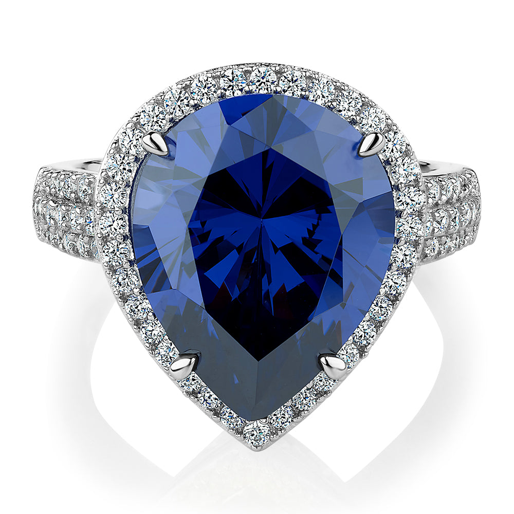 Dress ring with tanzanite simulant and 0.68 carats* of diamond simulants in sterling silver