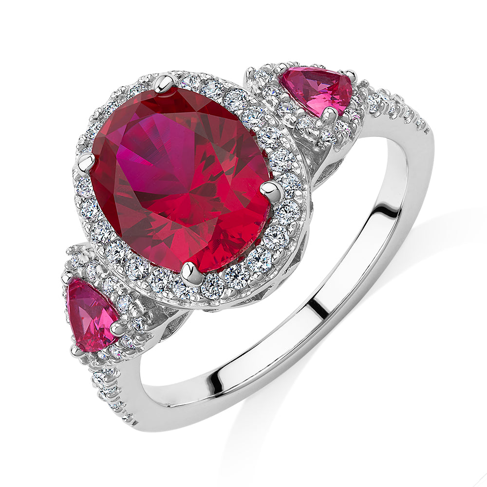 Dress ring with ruby simulants and 0.48 carats* of diamond simulants in sterling silver