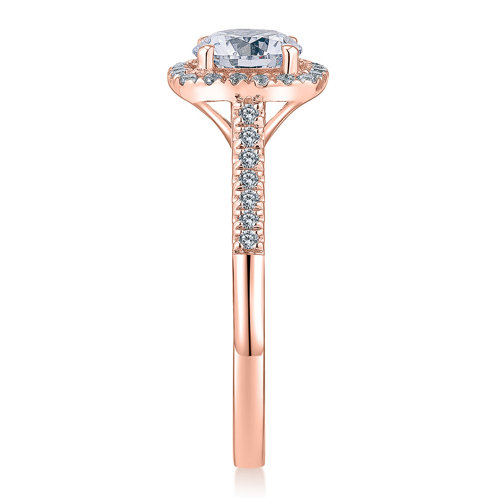 Round Brilliant halo engagement ring with 1.26 carats* of diamond simulants in 14 carat rose gold