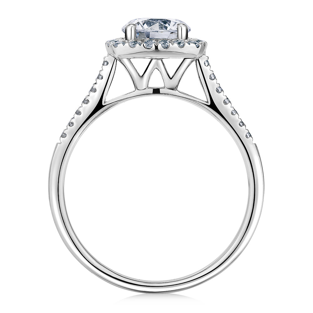 Round Brilliant halo engagement ring with 1.26 carats* of diamond simulants in 14 carat white gold