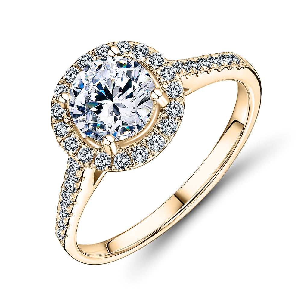 Round Brilliant halo engagement ring with 1.25 carats* of diamond simulants in 14 carat yellow gold