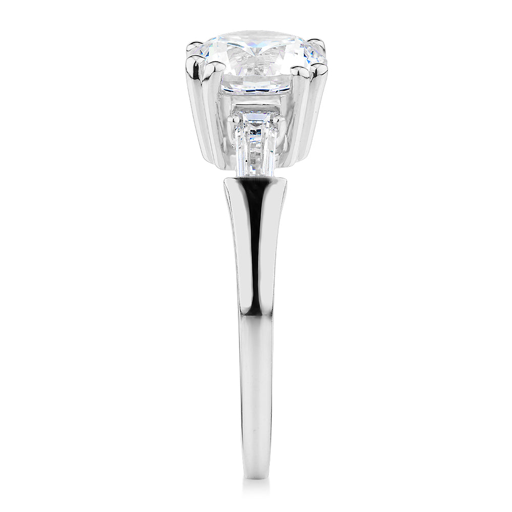 Round Brilliant and Baguette shouldered engagement ring with 2.46 carats* of diamond simulants in 10 carat white gold