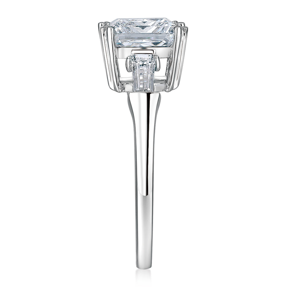 Princess Cut and Baguette shouldered engagement ring with 3.43 carats* of diamond simulants in 10 carat white gold