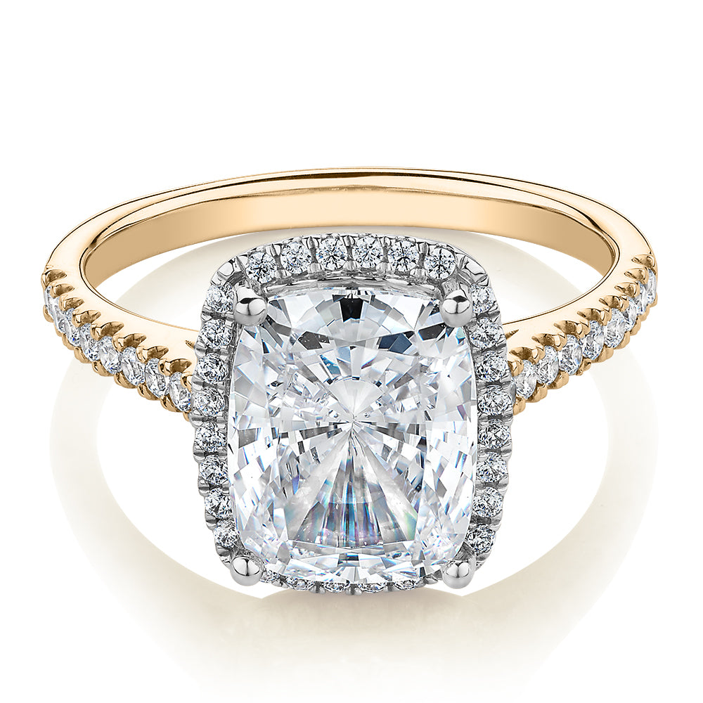 Cushion Radiant and Round Brilliant halo engagement ring with 3.73 carats* of diamond simulants in 10 carat yellow and white gold